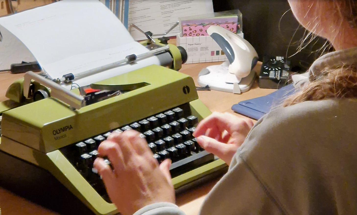 my fiancé playing with her old typewriter just so I could take a photo for this post